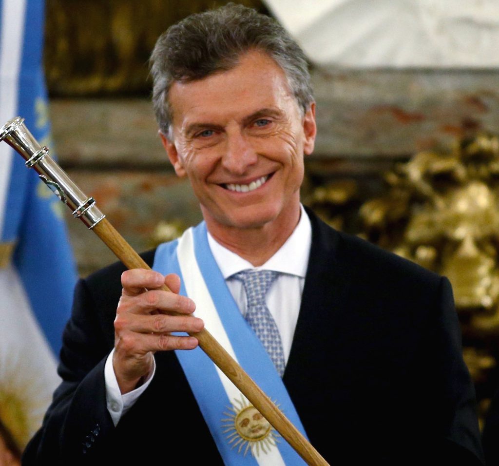 Argentina's President Mauricio Macri holds the symbolic leader's staff after being sworn-in as president at Casa Rosada Presidential Palace in Buenos Aires
