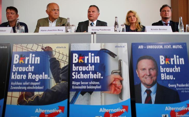 Padzerski, top candidate of the anti-immigration party AfD for the Berlin state elections, attends a news conference in Berlin